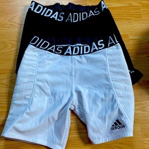 Two set of white and black softball slider shorts size women M.